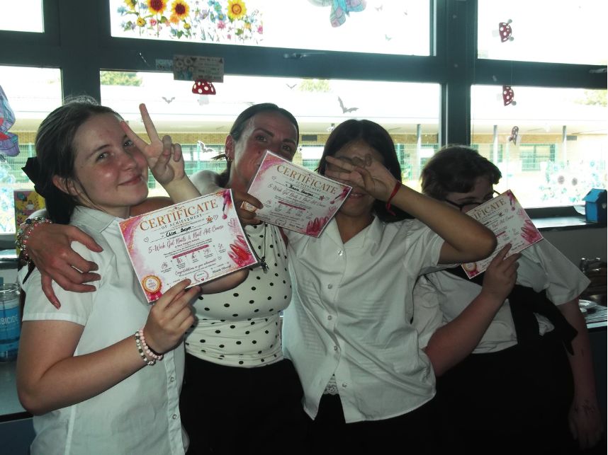 New Heights School Nail Bar students showing their certificates